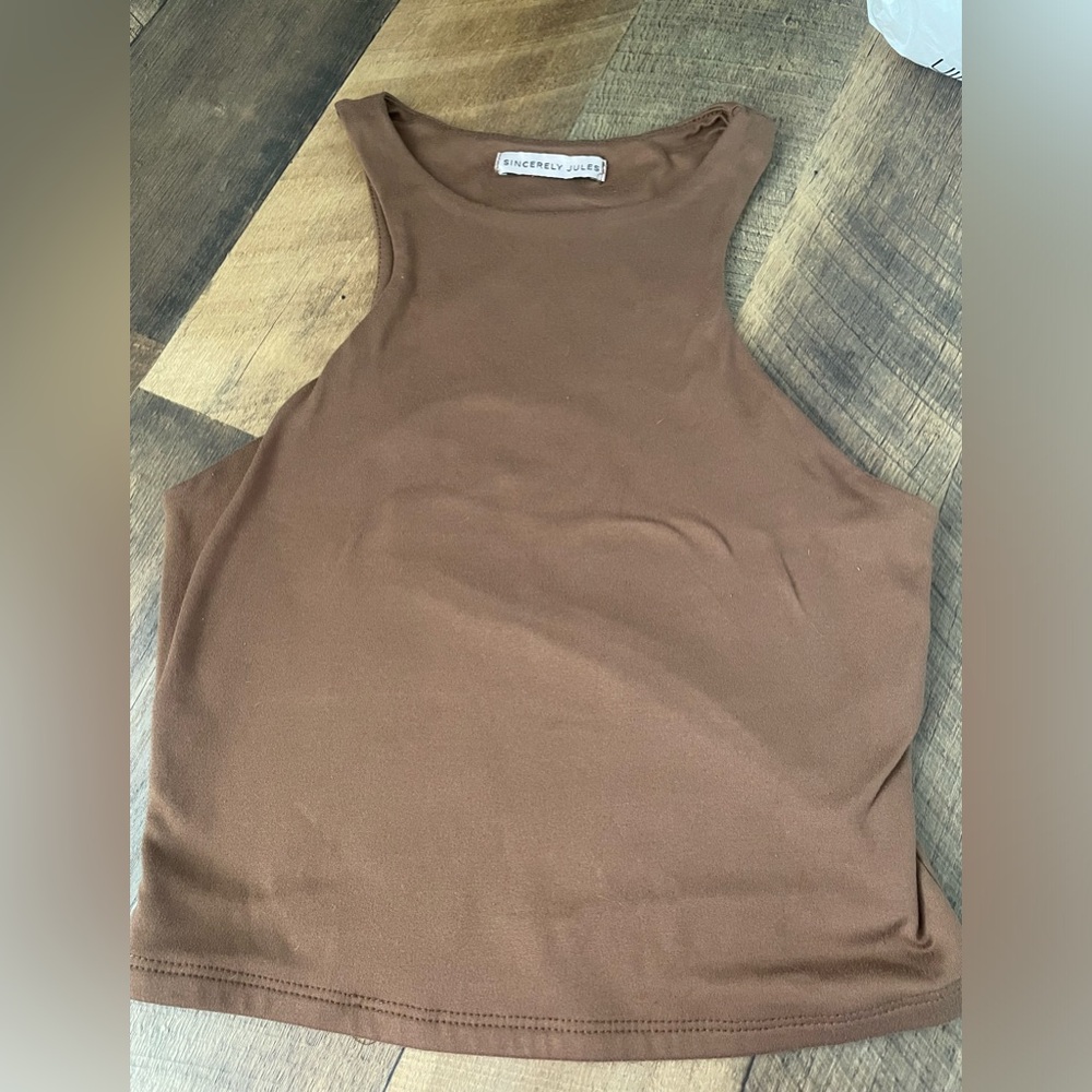 I’m selling this cute brown tank top! Size: Small 🤎